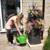 134L Rainwater Terrace Water Butt Planter - 2 Tier - Black & Light Green -PlantMates Shop 134 litre black water butt with green planters jpg