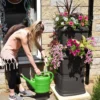 134L Rainwater Terrace Water Butt Planter - 2 Tier - Black & Dark Green -PlantMates Shop black 134 litre water butt with flowers 1 1 jpg