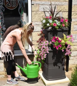 134L Rainwater Terrace Water Butt Planter - 2 Tier - Black -PlantMates Shop black 134 litre water butt with flowers jpg